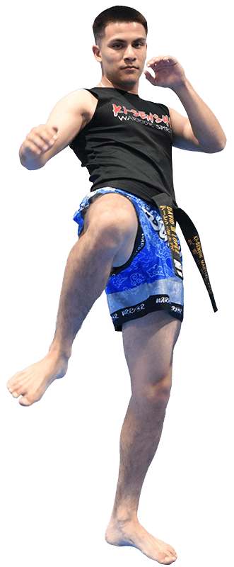 Student demonstrating a kick for a free martial arts trial in Chandler AZ