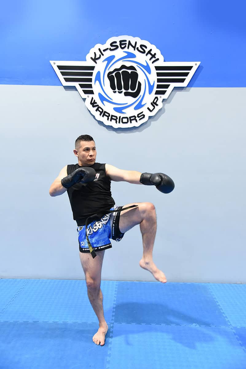 Action portrait of Sensei David Lopez Aguilar, 4th Dan instructor and founder of Ki-Senshi Martial Arts in Chandler, AZ.